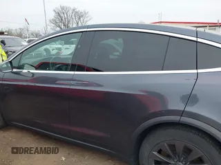 2019 Tesla Model X 75D with VIN 5YJXCDE24KF152150, listed as a IAAI auction lot 42015311 with 1 mi miles. Bid and sale history available at carsss.com. Image 14.