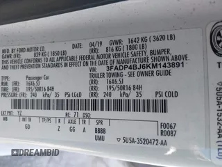 2019 Ford Fiesta SE z VIN 3FADP4BJ6KM143891, wystawiony jako IAAI lot #42244796 z przebiegiem 62 143 mil mil oraz . Historia ofert i sprzedaży dostępna na DreamBid. Obrazek 9.