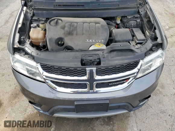 2013 Dodge Journey SXT with VIN 3C4PDCBG5DT695888, listed as a Copart auction lot 50302485 with 126,720 mi miles and Salvage Title. Bid and sale history available at DreamBid. Image 12.