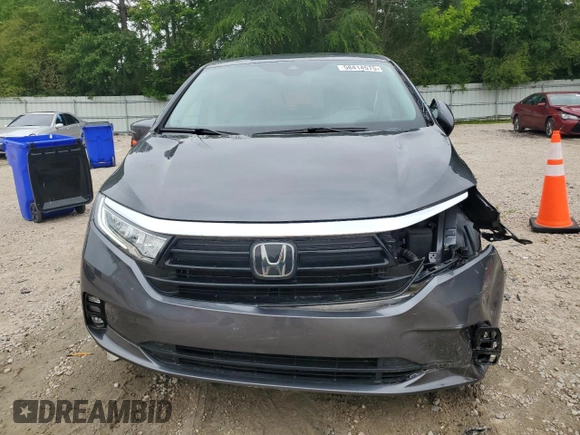 2023 Honda Odyssey Touring with VIN 5FNRL6H86PB024066, listed as a Copart auction lot 58414575 with 29,827 mi miles and Salvage title. Bid and sale history available at DreamBid. Image 5.