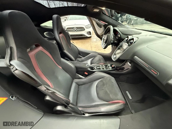 2023 McLaren GT with VIN SBM22GCA3PW002548, listed as a Copart auction lot 52157855 with 779 mi miles and Salvage Title. Bid and sale history available at carsss.com. Image 7.
