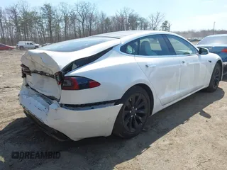 2017 Tesla Model S 100D with VIN 5YJSA1E29HF193543, listed as a IAAI auction lot 41903052 with 120,239 mi miles. Bid and sale history available at carsss.com. Image 4.