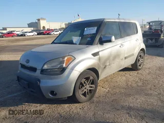 2011 Kia Soul + with VIN KNDJT2A28B7712001, listed as a IAAI auction lot 41767843 with 218,016 mi miles. Bid and sale history available at carsss.com. Image 2.
