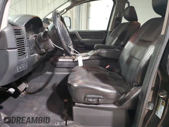 2013 Nissan Titan Pro-4X с VIN 1N6AA0EC1DN301354, выставлен на аукционе Copart как лот 45233045 с пробегом 172 450 миль миль и Списание • Salvage title. История ставок и продаж доступна на DreamBid. Изображение 7.