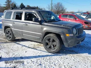 2015 Jeep Patriot Altitude Edition with VIN 1C4NJPBAXFD386705, listed as a IAAI auction lot 41392260 with 163,131 mi miles. Bid and sale history available at carsss.com. Image 1.