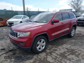 2012 Jeep Grand Cherokee Laredo with VIN 1C4RJFAG7CC221682, listed as a IAAI auction lot 41881922 with 218,762 mi miles. Bid and sale history available at carsss.com. Image 21.