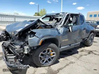 2023 Rivian R1T Launch Edition with VIN 7FCTGAALXPN020447, listed as a Copart auction lot 54154844 with 9,527 mi miles and Non Repairable. Bid and sale history available at carsss.com. Image 1.