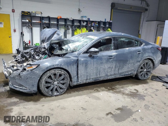 2021 Mazda 6 Carbon Edition with VIN JM1GL1WY4M1609858, listed as a Copart auction lot 41977695 with Not Provided miles and Salvage Title. Bid and sale history available at DreamBid. Image 1.
