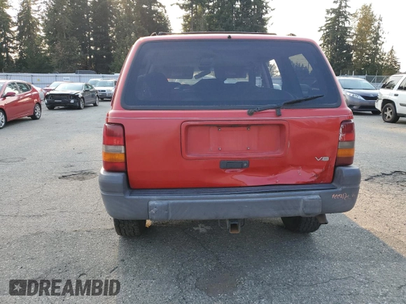 1996 Jeep Grand Cherokee z VIN 1J4EZ58Y5TC142263, wystawiony jako Copart lot #70532894 z przebiegiem Nie podano mil oraz Szkoda całkowita • Salvage title. Historia ofert i sprzedaży dostępna na DreamBid. Obrazek 6.