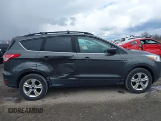 2016 Ford Escape SE with VIN 1FMCU9G92GUC22029, listed as a IAAI auction lot 42032478 with 133,853 mi miles. Bid and sale history available at carsss.com. Image 6.