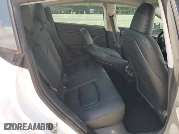 2023 Tesla Model 3 with VIN 5YJ3E1EA6PF510323, listed as a Copart auction lot 52094495 with 115,928 mi miles and Salvage Title. Bid and sale history available at DreamBid. Image 10.