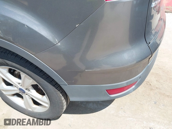 2014 Ford Escape SE with VIN 1FMCU0G98EUB23109, listed as a IAAI auction lot 42186287 with 134,793 mi miles. Bid and sale history available at carsss.com. Image 13.