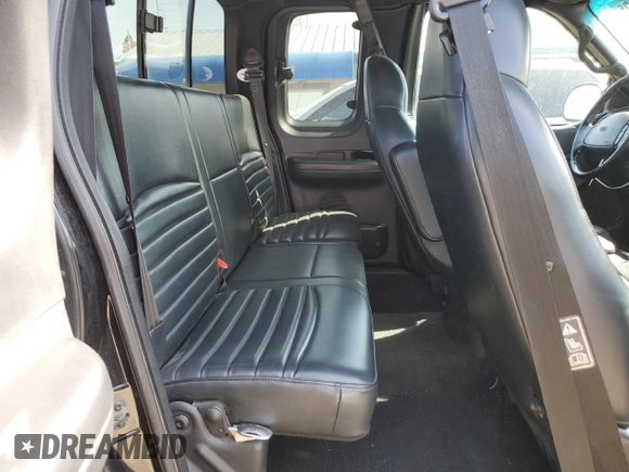 2000 Ford F-150 XL with VIN 2FTRX07L6YCA93968, listed as a Copart auction lot 52541195 with 252,092 mi miles and Salvage title. Bid and sale history available at DreamBid. Image 11.