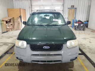 2002 Ford Escape XLS Value with VIN 1FMYU01B32KC48043, listed as a Copart auction lot 63011005 with 167,185 mi miles and Salvage title. Bid and sale history available at DreamBid. Image 5.