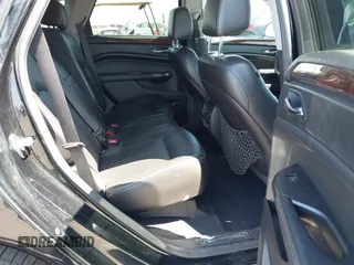 2012 Cadillac SRX Performance Collection z VIN 3GYFNBE30CS659973, wystawiony jako IAAI lot #42555119 z przebiegiem 141 842 mil mil oraz . Historia ofert i sprzedaży dostępna na DreamBid. Obrazek 8.