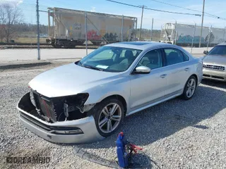 2013 Volkswagen Passat SEL Premium with VIN 1VWCM7A37DC024252, listed as a IAAI auction lot 41944978 with 168,616 mi miles. Bid and sale history available at carsss.com. Image 2.