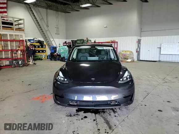 2024 Tesla Model Y Long Range with VIN 7SAYGDEE6RA253946, listed as a Copart auction lot 46699445 with 6,008 mi miles and Salvage Title. Bid and sale history available at DreamBid. Image 12.