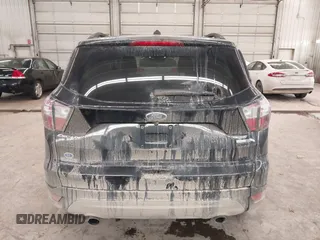 2018 Ford Escape SE z VIN 1FMCU9GD0JUC25636, wystawiony jako IAAI lot #40996760 z przebiegiem 70 097 mil mil oraz . Historia ofert i sprzedaży dostępna na DreamBid. Obrazek 17.