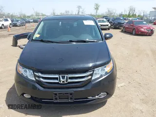 2014 Honda Odyssey Touring with VIN 5FNRL5H94EB079518, listed as a IAAI auction lot 42095098 with 141,019 mi miles and . Bid and sale history available at DreamBid. Image 13.