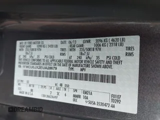 2014 Ford Escape Titanium with VIN 1FMCU0JX2EUA28679, listed as a IAAI auction lot 41930585 with 164,038 mi miles. Bid and sale history available at carsss.com. Image 9.