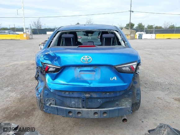 2017 Toyota Yaris iA with VIN 3MYDLBYV7HY175918, listed as a IAAI auction lot 41866877 with 86,564 mi miles. Bid and sale history available at carsss.com. Image 16.