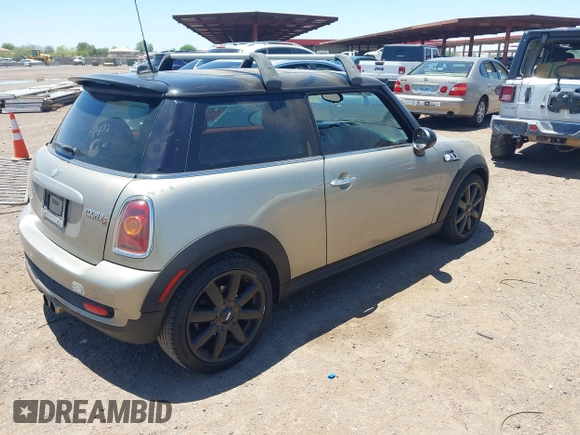 2010 MINI Hardtop S with VIN WMWMF7C50ATZ71187, listed as a IAAI auction lot 42440637 with 82,595 mi miles and . Bid and sale history available at DreamBid. Image 4.