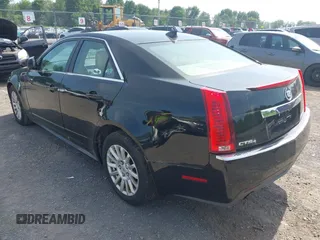 2012 Cadillac CTS Luxury z VIN 1G6DG5E58C0134874, wystawiony jako IAAI lot #42564120 z przebiegiem 121 053 mil mil oraz . Historia ofert i sprzedaży dostępna na DreamBid. Obrazek 3.