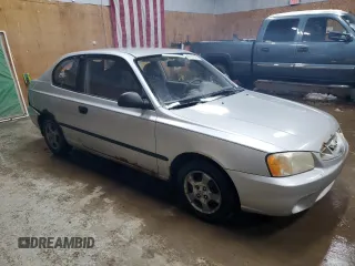 2002 Hyundai Accent with VIN KMHCF35G82U192732, listed as a Copart auction lot 85187074 with 224,194 mi miles and Clean title. Bid and sale history available at DreamBid. Image 4.