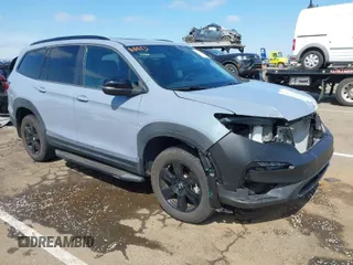 2022 Honda Pilot TrailSport z VIN 5FNYF6H88NB048630, wystawiony jako IAAI lot #41882531 z przebiegiem 17 443 mil mil oraz . Historia ofert i sprzedaży dostępna na DreamBid. Obrazek 1.