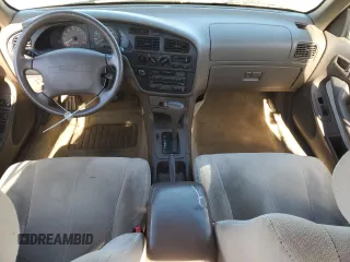 1996 Toyota Camry DX with VIN JT2BG12K1T0395294, listed as a Copart auction lot 47295405 with 259,898 mi miles and Salvage Title. Bid and sale history available at carsss.com. Image 8.