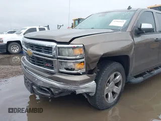 2014 Chevrolet Silverado 1500 LTZ with VIN 1GCVKSEC5EZ249444, listed as a IAAI auction lot 41904569 with 123,650 mi miles and . Bid and sale history available at DreamBid. Image 6.