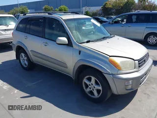 2001 Toyota RAV4 with VIN JTEHH20V910086909, listed as a IAAI auction lot 42672422 with 210,658 mi miles and . Bid and sale history available at DreamBid. Image 1.