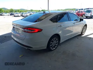 2017 Ford Fusion SE z VIN 3FA6P0HD7HR309432, wystawiony jako IAAI lot #42163947 z przebiegiem 201 575 mil mil oraz . Historia ofert i sprzedaży dostępna na DreamBid. Obrazek 4.
