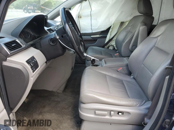 2014 Honda Odyssey Touring with VIN 5FNRL5H95EB044504, listed as a Copart auction lot 59228035 with 259,035 mi miles and Clean title. Bid and sale history available at DreamBid. Image 7.