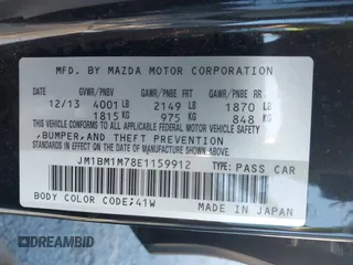 2014 Mazda 3 i Grand Touring z VIN JM1BM1M78E1159912, wystawiony jako IAAI lot #42079661 z przebiegiem 105 039 mil mil oraz . Historia ofert i sprzedaży dostępna na DreamBid. Obrazek 9.