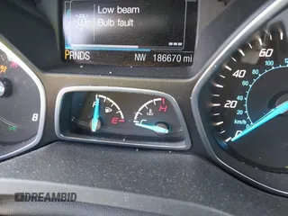 2014 Ford Escape SE with VIN 1FMCU9GX0EUC75145, listed as a IAAI auction lot 42048519 with 186,670 mi miles and . Bid and sale history available at DreamBid. Image 7.