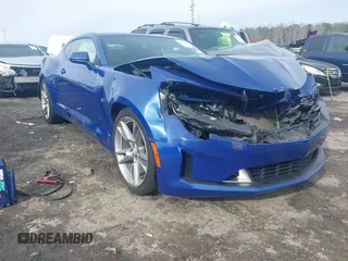 2021 Chevrolet Camaro 1LT with VIN 1G1FB1RX6M0134844, listed as a IAAI auction lot 41059096 with 130,989 mi miles. Bid and sale history available at carsss.com. Image 1.