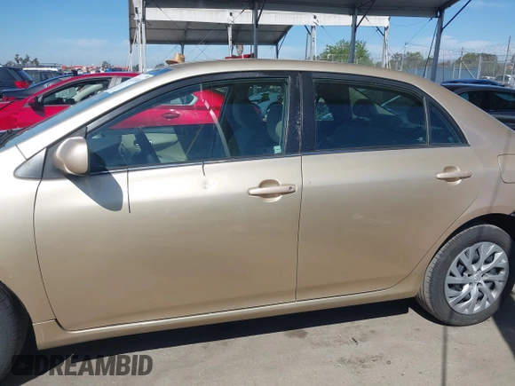 2013 Toyota Corolla L with VIN 5YFBU4EE2DP212354, listed as a IAAI auction lot 42023008 with 193,833 mi miles and . Bid and sale history available at DreamBid. Image 15.