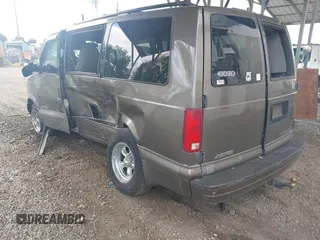 1999 Chevrolet Astro z VIN 1GNDM19W6XB162935, wystawiony jako IAAI lot #42230563 z przebiegiem 317 204 mil mil oraz . Historia ofert i sprzedaży dostępna na DreamBid. Obrazek 3.