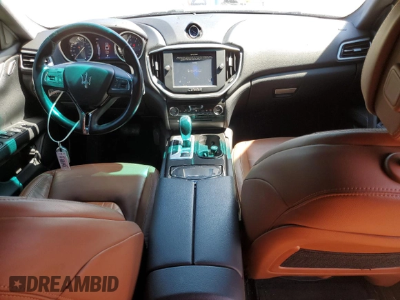 2015 Maserati Ghibli с VIN ZAM57XSA9F1154155, выставлен на аукционе Copart как лот 57093695 с пробегом 63 190 миль миль и Списание • Salvage title. История ставок и продаж доступна на DreamBid. Изображение 8.