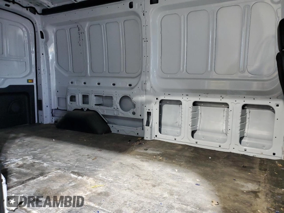 2023 Ford Transit Cargo z VIN 1FTBR1C86PKB96319, wystawiony jako Copart lot #59361285 z przebiegiem 34 823 mil mil oraz Szkoda całkowita • Salvage title. Historia ofert i sprzedaży dostępna na DreamBid. Obrazek 11.