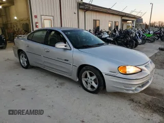 2001 Pontiac Grand Am GT with VIN 1G2NW52E11C245761, listed as a Copart auction lot 80585364 with 179,883 mi miles and Clean Title. Bid and sale history available at carsss.com. Image 4.