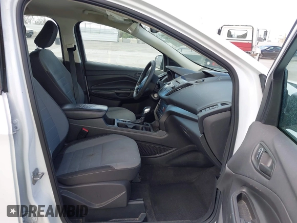 2018 Ford Escape S z VIN 1FMCU0F78JUA56974, wystawiony jako IAAI lot #42232294 z przebiegiem 63 511 mil mil oraz . Historia ofert i sprzedaży dostępna na DreamBid. Obrazek 5.