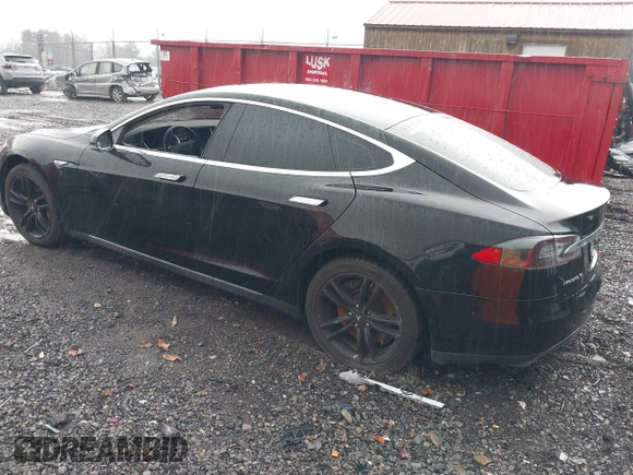 2014 Tesla Model S 60 with VIN 5YJSA1H18EFP28053, listed as a IAAI auction lot 41191521 with 82,207 mi miles and . Bid and sale history available at DreamBid. Image 3.