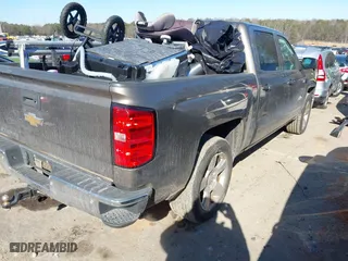 2015 Chevrolet Silverado 1500 LT with VIN 3GCPCREC3FG292888, listed as a IAAI auction lot 41416740 with 123,000 mi miles. Bid and sale history available at carsss.com. Image 4.