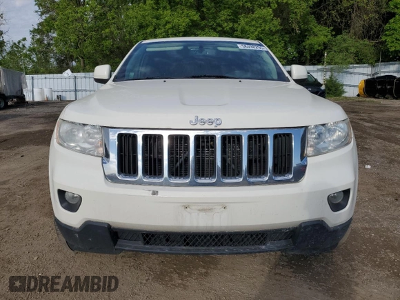 2011 Jeep Grand Cherokee Laredo z VIN 1J4RR4GG1BC506083, wystawiony jako Copart lot #58498295 z przebiegiem 122 847 mil mil oraz Czysty tytuł • Clean title. Historia ofert i sprzedaży dostępna na DreamBid. Obrazek 5.