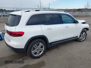 2022 Mercedes-Benz GLB 250 z VIN W1N4M4HB7NW173675, wystawiony jako IAAI lot #41744858 z przebiegiem 20 909 mil mil oraz . Historia ofert i sprzedaży dostępna na DreamBid. Obrazek 4.