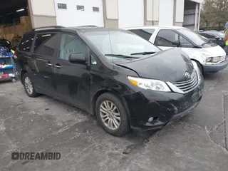 2013 Toyota Sienna XLE AAS with VIN 5TDYK3DC2DS355614, listed as a IAAI auction lot 41360581 with 180,086 mi miles and . Bid and sale history available at carsss.com. Image 1.