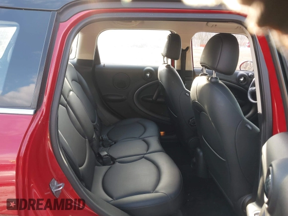 2013 MINI Countryman S z VIN WMWZC3C58DWP22372, wystawiony jako IAAI lot #41523123 z przebiegiem 50 410 mil mil oraz . Historia ofert i sprzedaży dostępna na DreamBid. Obrazek 8.