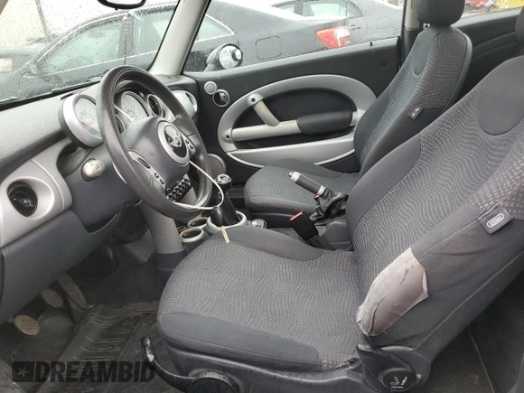 2002 MINI Hardtop with VIN WMWRC33482TC36332, listed as a Copart auction lot 42811115 with 203,708 mi miles and Salvage Title. Bid and sale history available at DreamBid. Image 7.